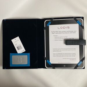 Lodi’s black with blue accents Dakota IPad cover new with tags 8”x10”
